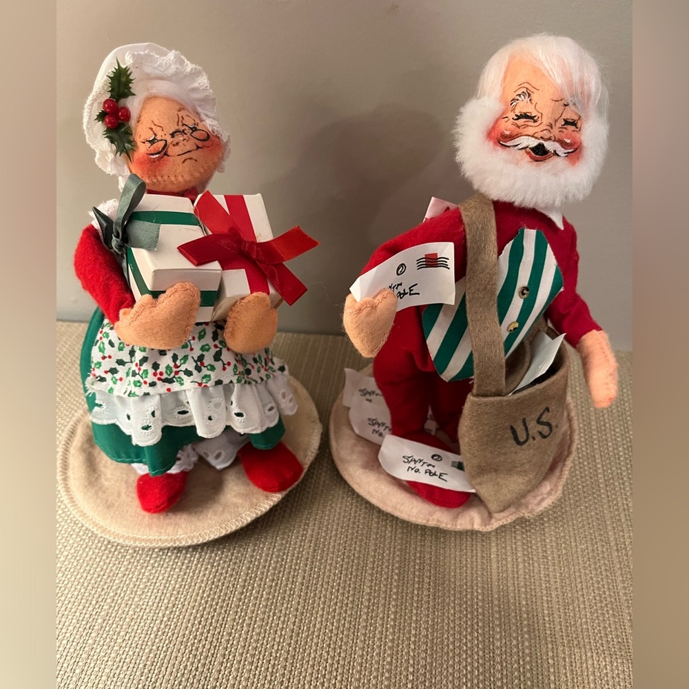 Annalee 1993 Mr Claus mail carrier & 1990 Mrs Claus holding gifts.